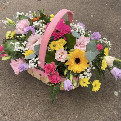 Sherbet Twist - This delightful collection of seasonal blooms is a beautiful way to send your affections. A pretty arrangement in a classic basket simply fizzing with joy and character.