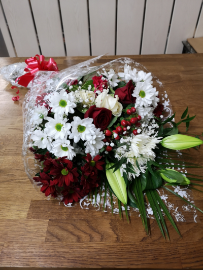 Florist choice Bouquet - A beautiful bouquet of mixed flowers suitable for any occasion, customer can chose colours or left to the florist for their choice.
