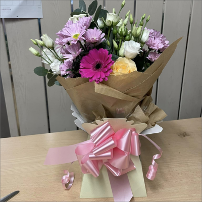 Nature's Choice - Show your love in the best possible way with this gorgeous hand-tied bouquet featuring a fabulous selection of flowers