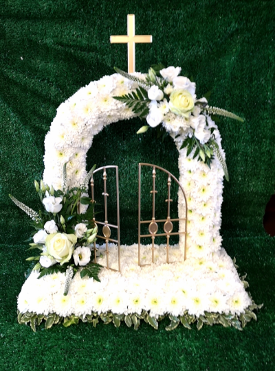 GATES OF HEAVEN - The Gates of heaven is a substantial funeral tribute and various flowers can be used on the small flower sprays to the customers choice ,Red Roses or other, Funeral Tributes must be ordered well  in advance and NOT SAME DAY