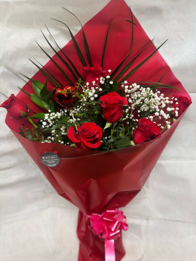 6 red rose bouquet - 6 red roses gift wrapped in cellophane with foliage and gypsophillia 
Price includes £5 delivery charge